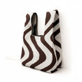 Mocha waves knitted bag - Colibri Enso